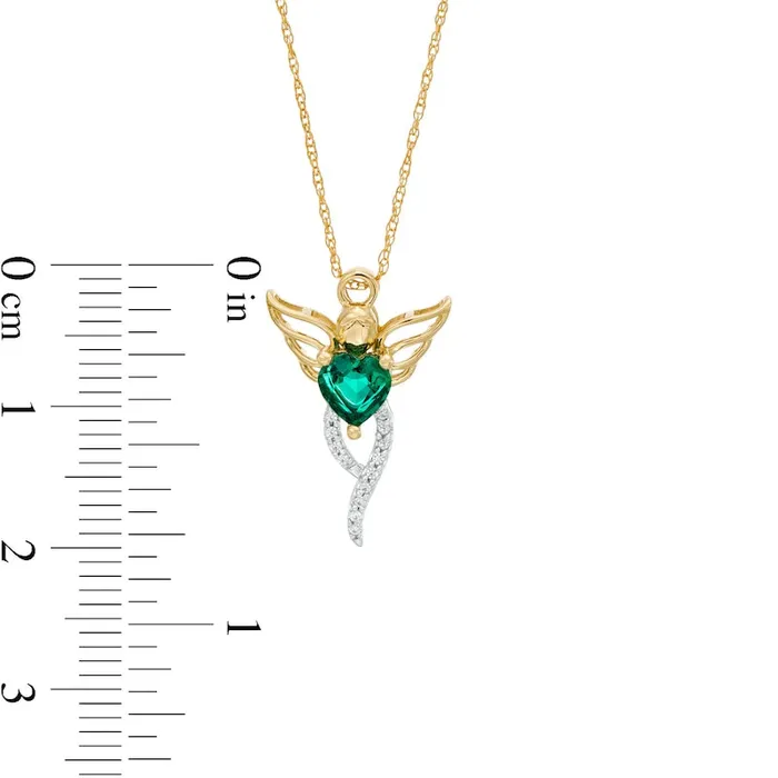 Goldia Necklaces 50mm HeartShaped LabCreated Emerald and 005 CT TW Diamond Angel Pendant in 10K Yellow Gold Goldia Necklaces 50mm HeartShaped LabCreated Emerald and 005 CT TW Diamond Angel Pendant in 10K Yellow Gold