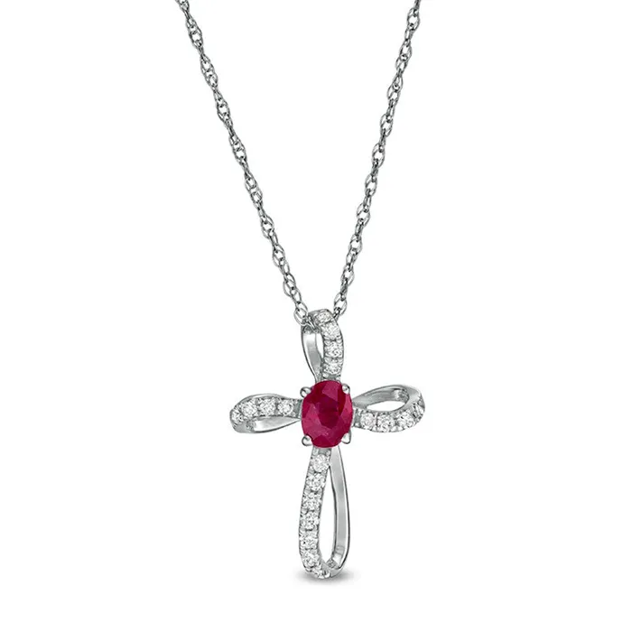 Goldia Necklaces Oval Ruby and 01 CT TW Natural Diamond Pinwheel Cross Pendant in 10K White Gold Goldia Necklaces Oval Ruby and 01 CT TW Natural Diamond Pinwheel Cross Pendant in 10K White Gold