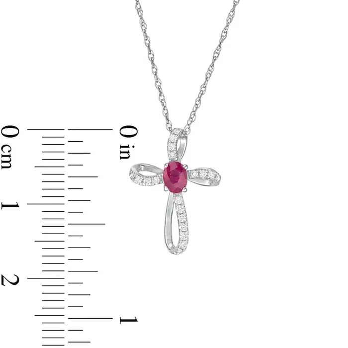 Goldia Necklaces Oval Ruby and 01 CT TW Natural Diamond Pinwheel Cross Pendant in 10K White Gold Goldia Necklaces Oval Ruby and 01 CT TW Natural Diamond Pinwheel Cross Pendant in 10K White Gold