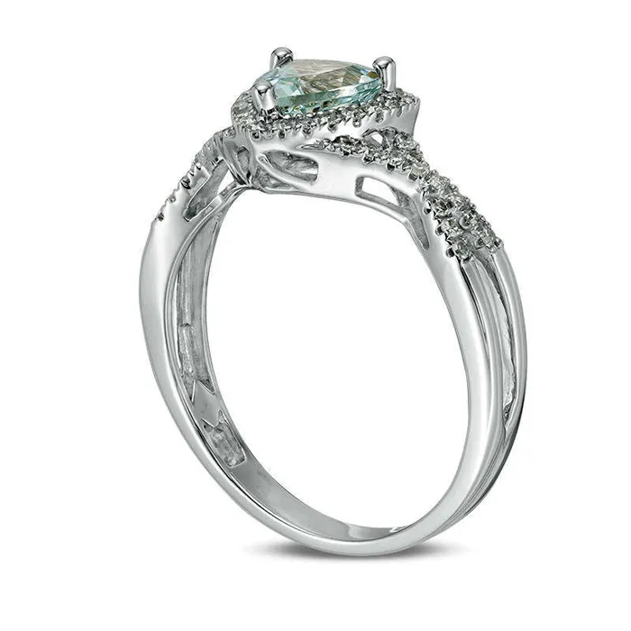 Goldia Rings 60mm TrillionCut Aquamarine and 020 CT TW Natural Diamond Frame CrissCross Shank Ring in Solid 10K White Gold Goldia Rings 60mm TrillionCut Aquamarine and 020 CT TW Natural Diamond Frame CrissCross Shank Ring in Solid 10K White Gold