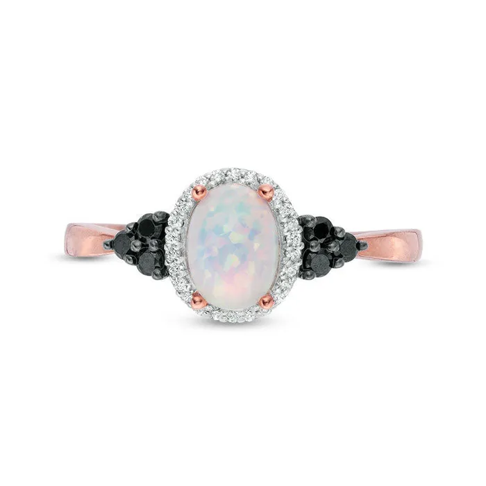 Goldia Rings Oval LabCreated Opal and 017 CT TW Enhanced Black and White Diamond Frame TriSides Ring in Solid 10K Rose Gold Goldia Rings Oval LabCreated Opal and 017 CT TW Enhanced Black and White Diamond Frame TriSides Ring in Solid 10K Rose Gold