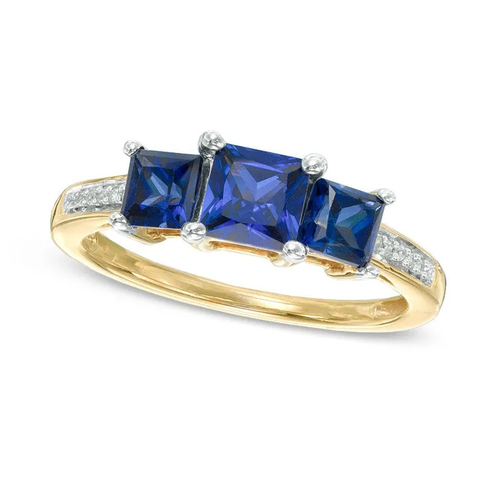 PrincessCut LabCreated Blue Sapphire and Diamond Accent Three Stone Ring in Solid 10K Yellow Gold Goldia Rings PrincessCut LabCreated Blue Sapphire and Diamond Accent Three Stone Ring in Solid 10K Yellow Gold Goldia Rings